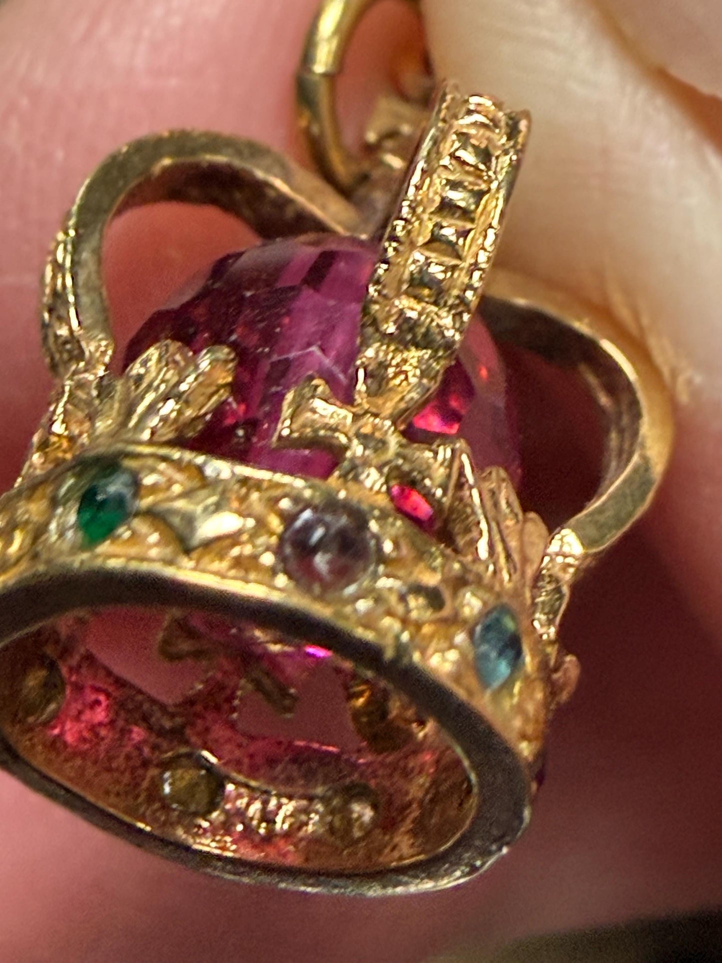 Beautiful jewelled crown charm .2.5 g in weight 20 m x9 m approximately