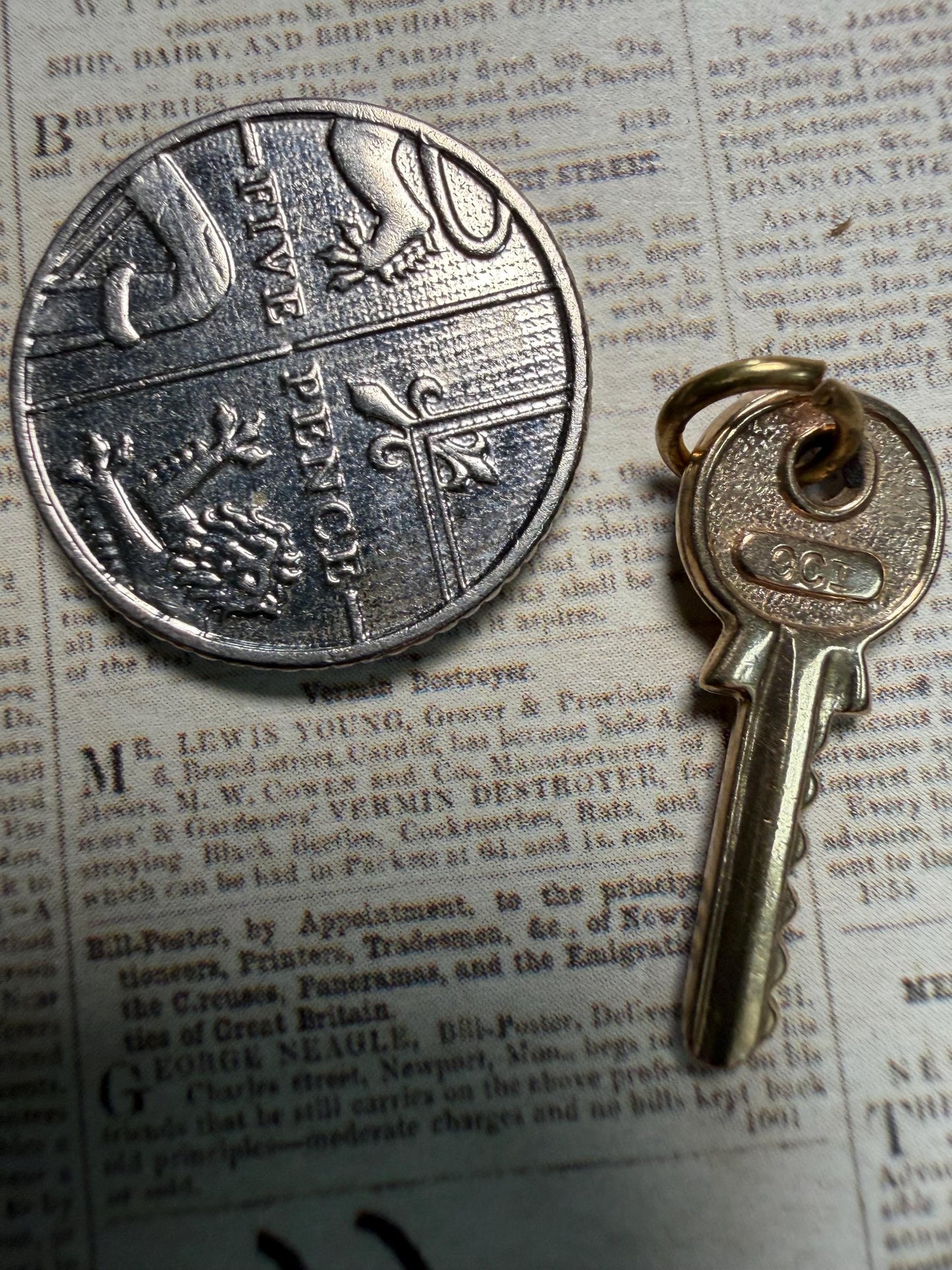 Little hallmarked 9 ct key