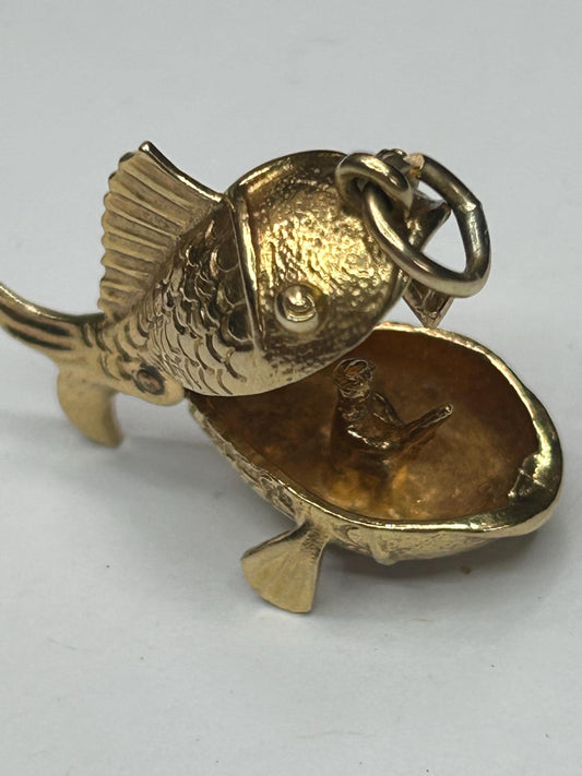 9 ct ornate fish charm with a little man in a boat inside - unique piece
