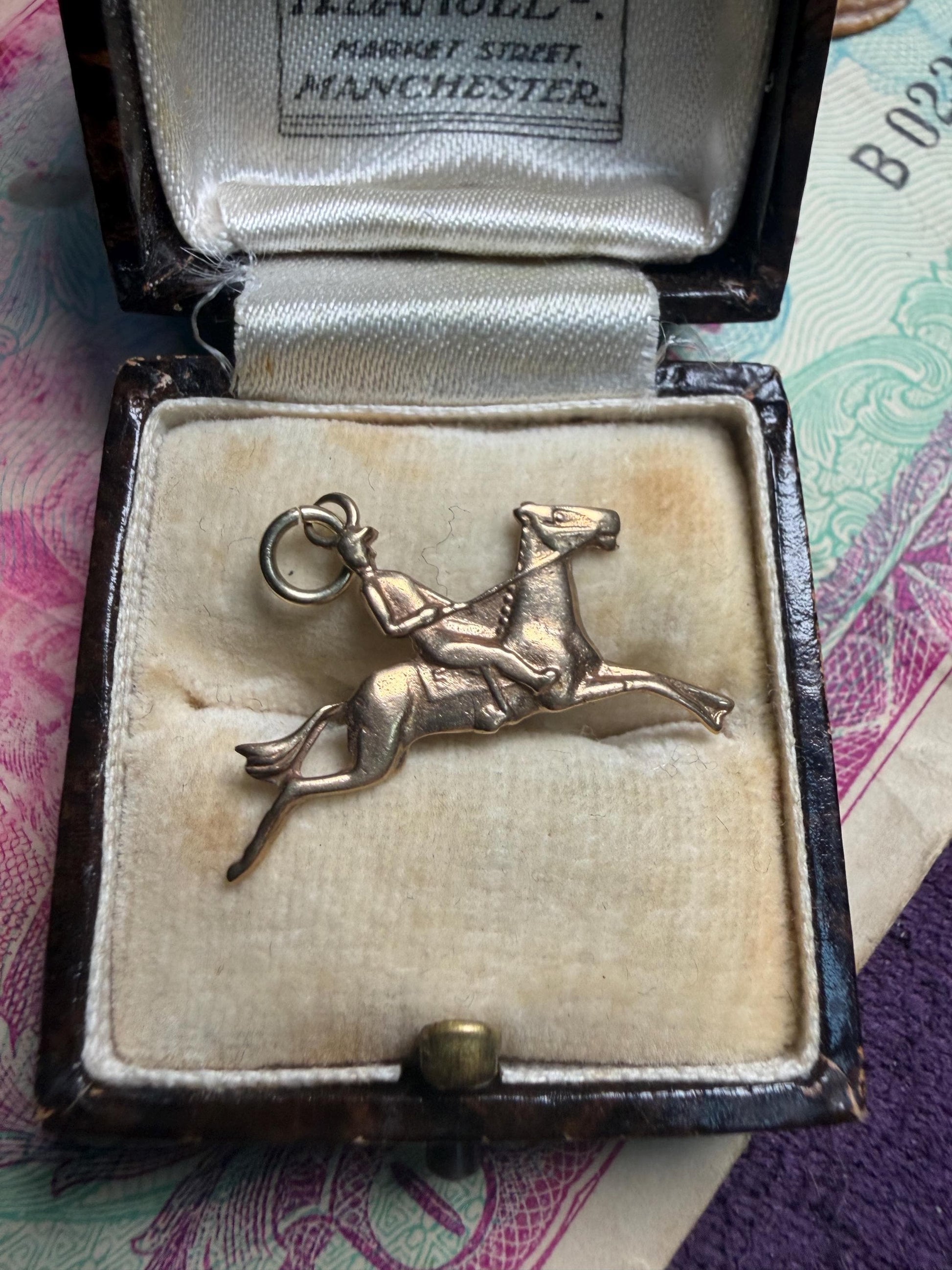 Horse with jockey 9ct gold charm