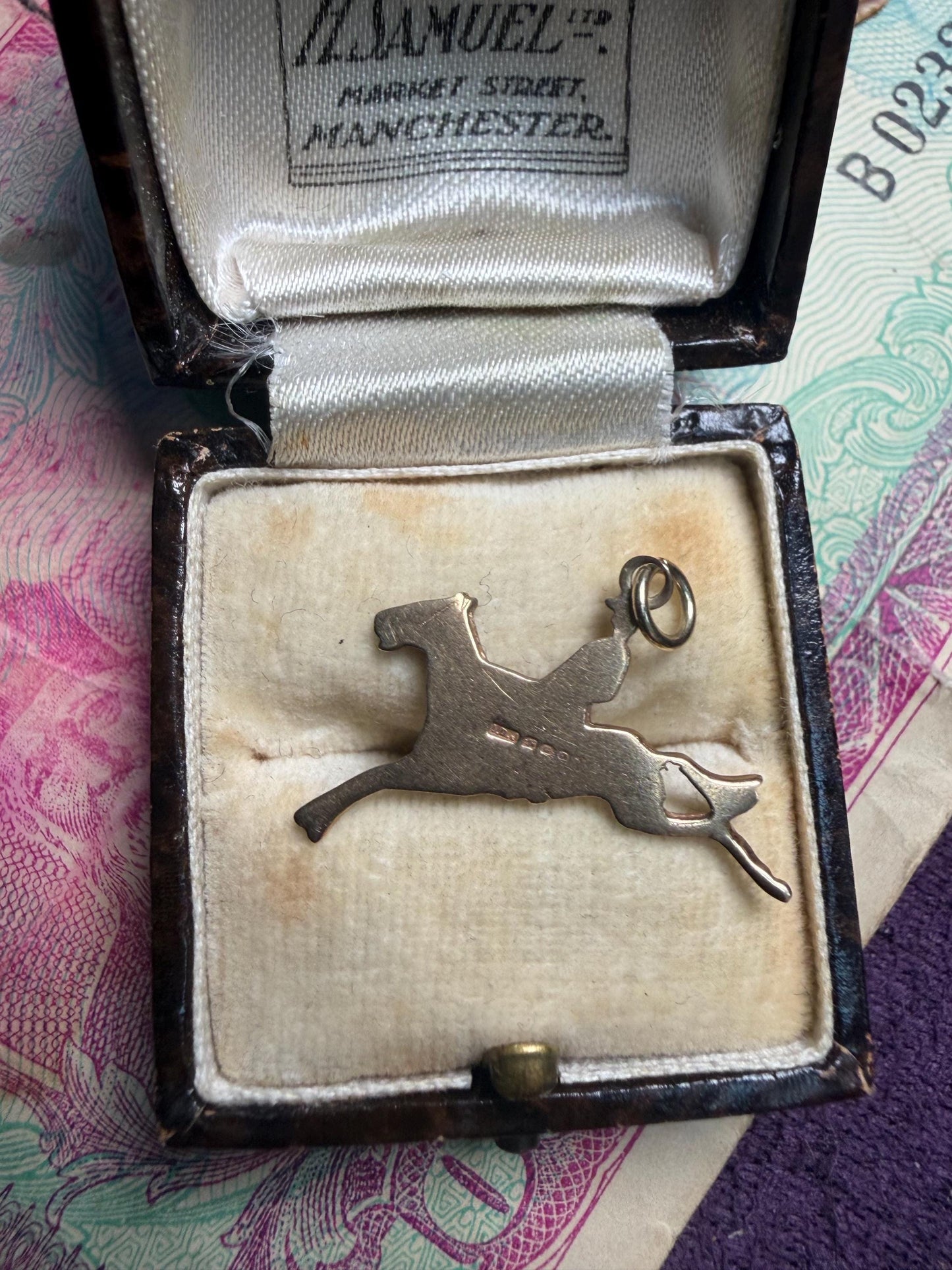 Horse with jockey 9ct gold charm