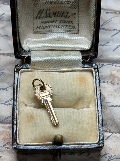 Small 9ct key charm