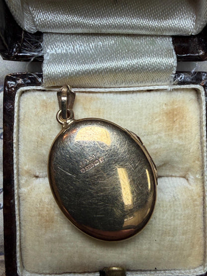 9 ct gold oval pendant beautifully engraved - quite big