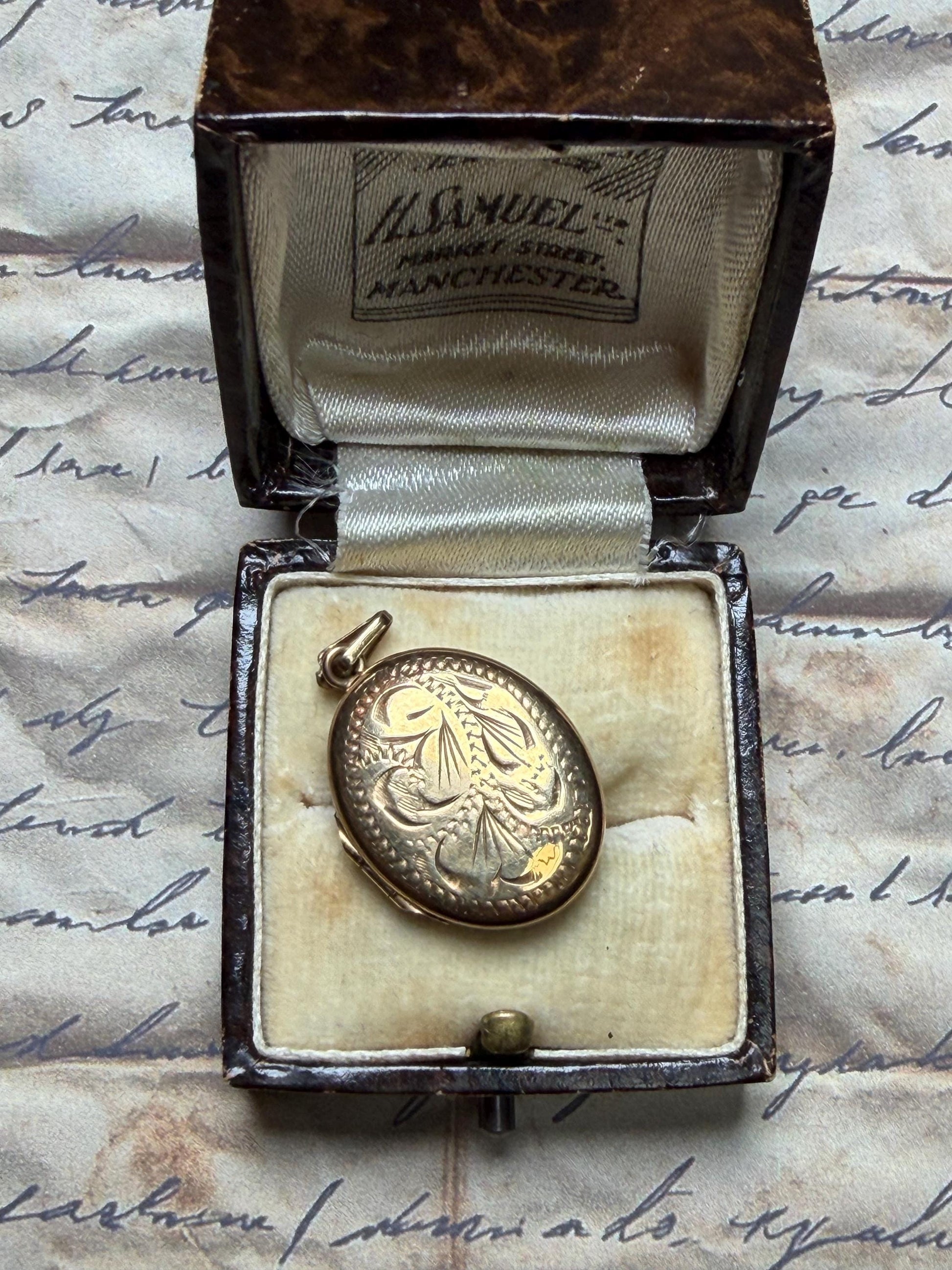 9 ct gold oval pendant beautifully engraved - quite big