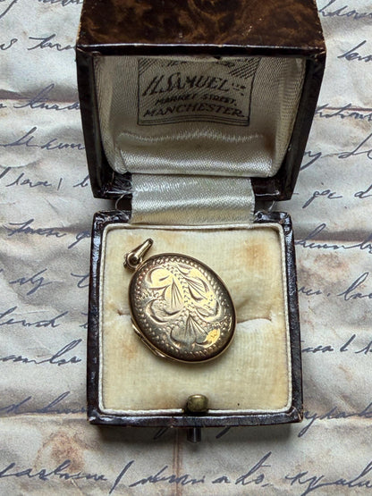 9 ct gold oval pendant beautifully engraved - quite big
