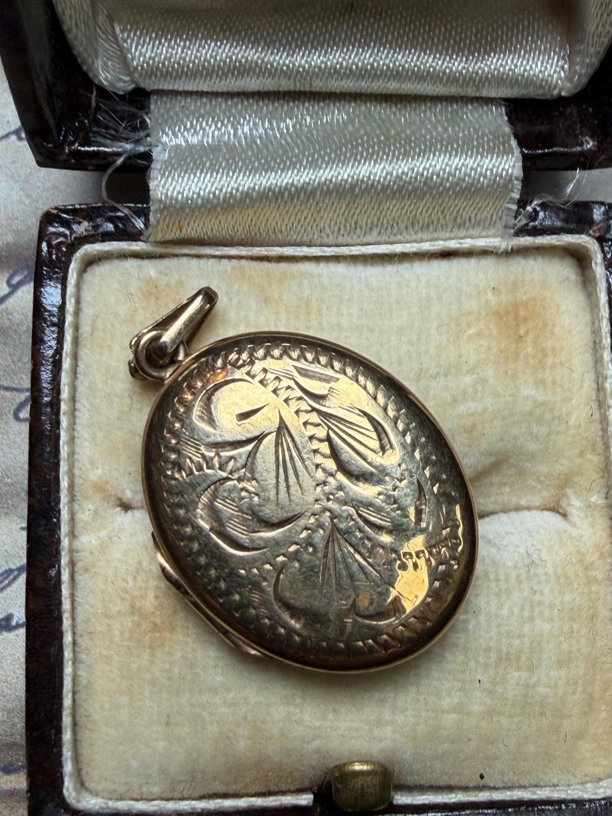 9 ct gold oval pendant beautifully engraved - quite big