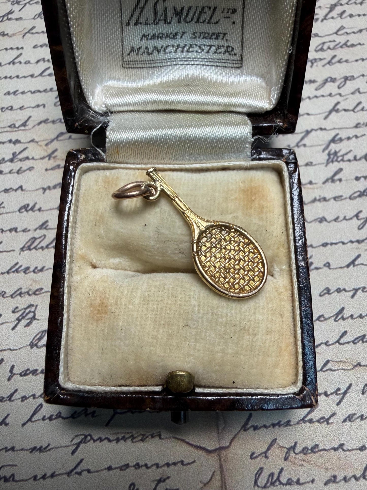 Lovely tennis racket with ball tennis racket 9ct gold