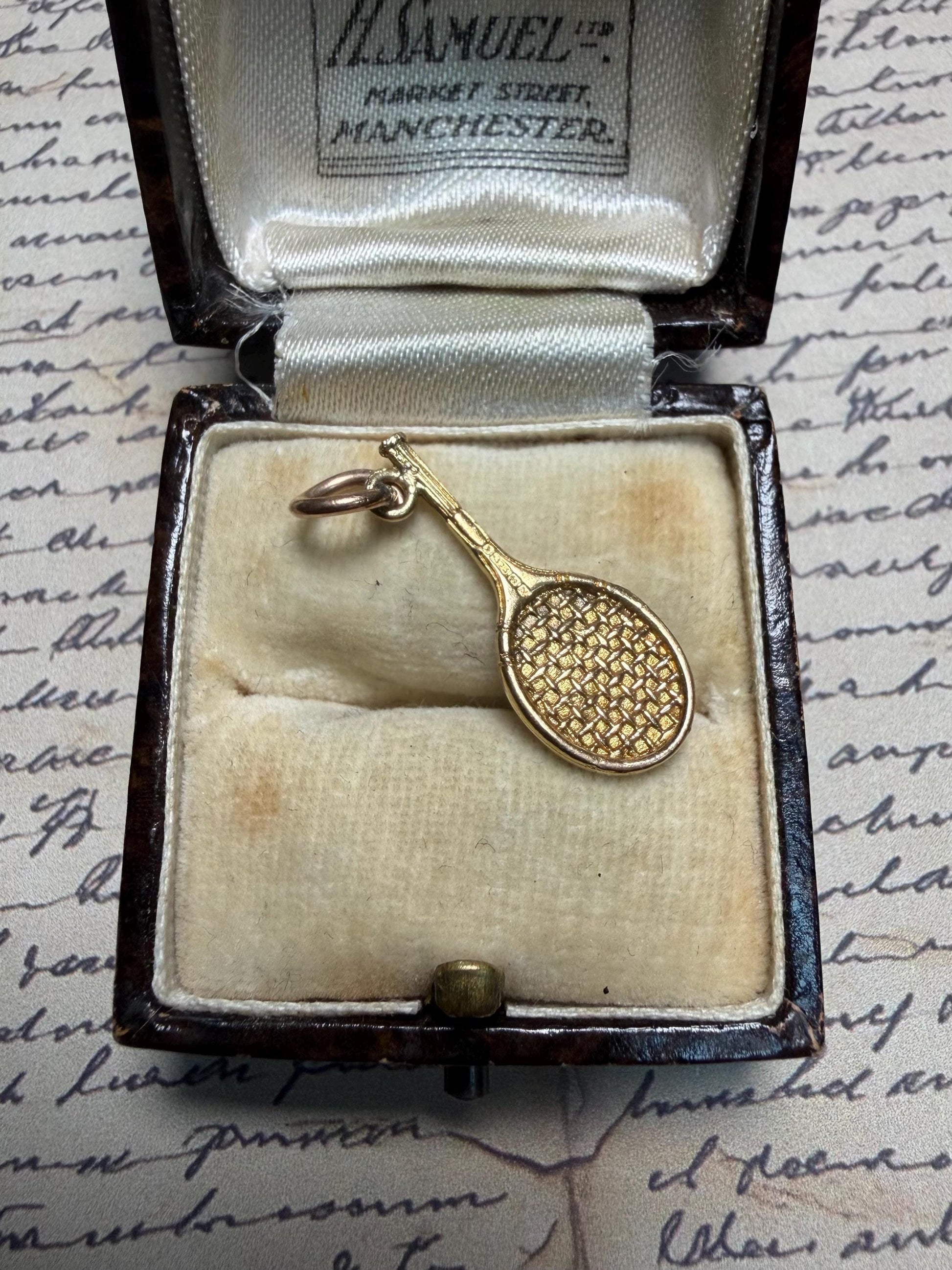 Lovely tennis racket with ball tennis racket 9ct gold