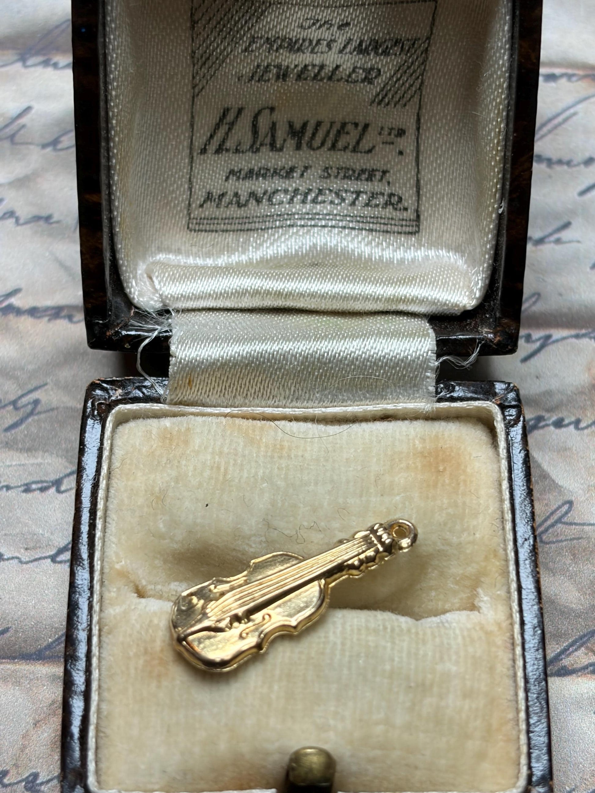 9 ct gold guitar charm