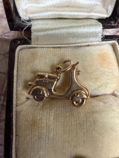 Really cool scooter -9 ct solid gold hallmarked WWC 375 -.79 g 17m long by 12 m high approx ( box not included
