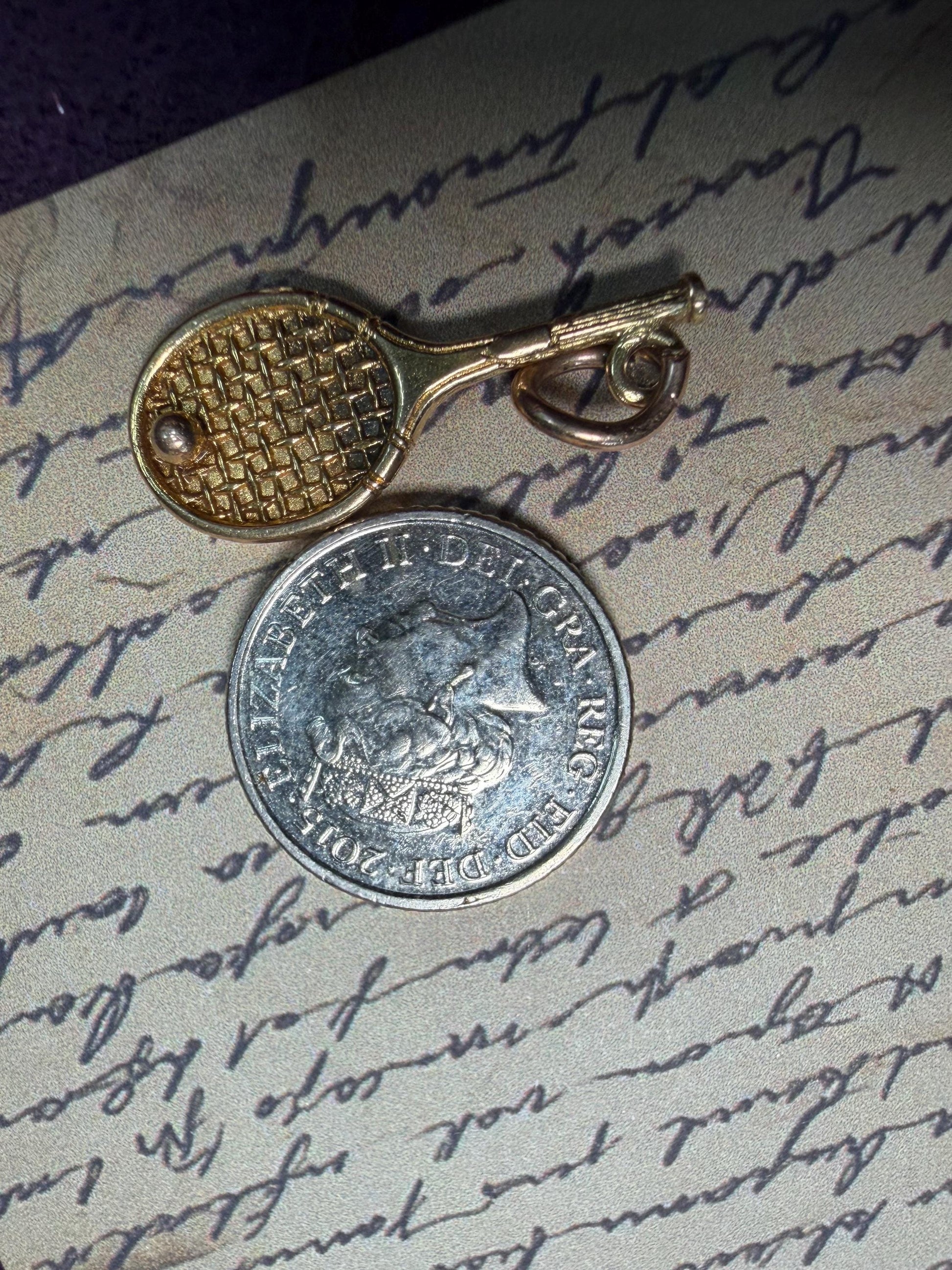 Lovely tennis racket with ball tennis racket 9ct gold