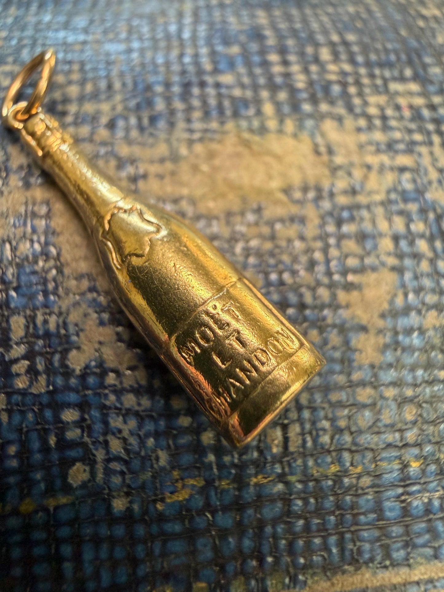 Champagne bottle ( moet) lovely writing on the front - .80 g