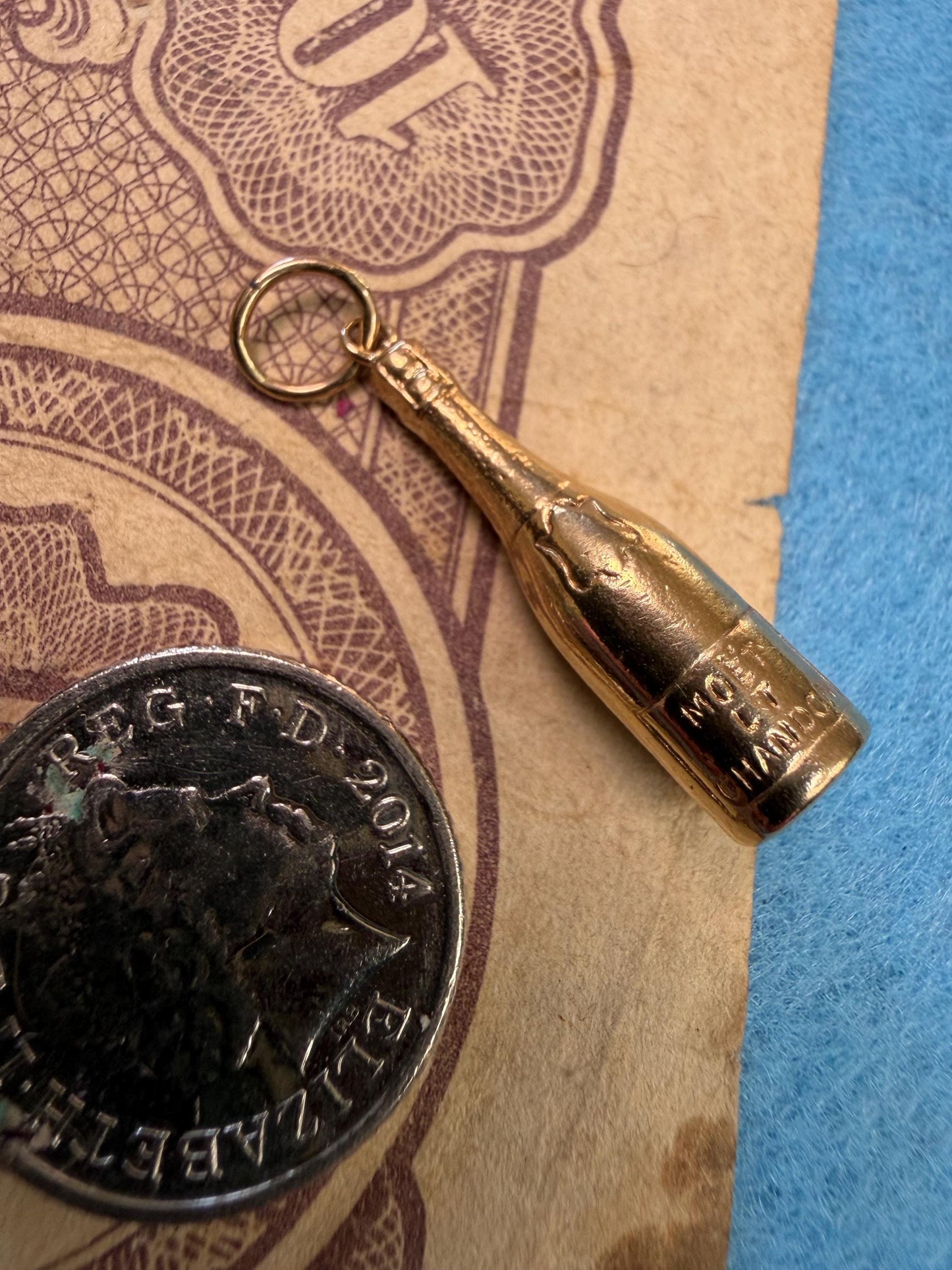 Champagne bottle ( moet) lovely writing on the front - .80 g