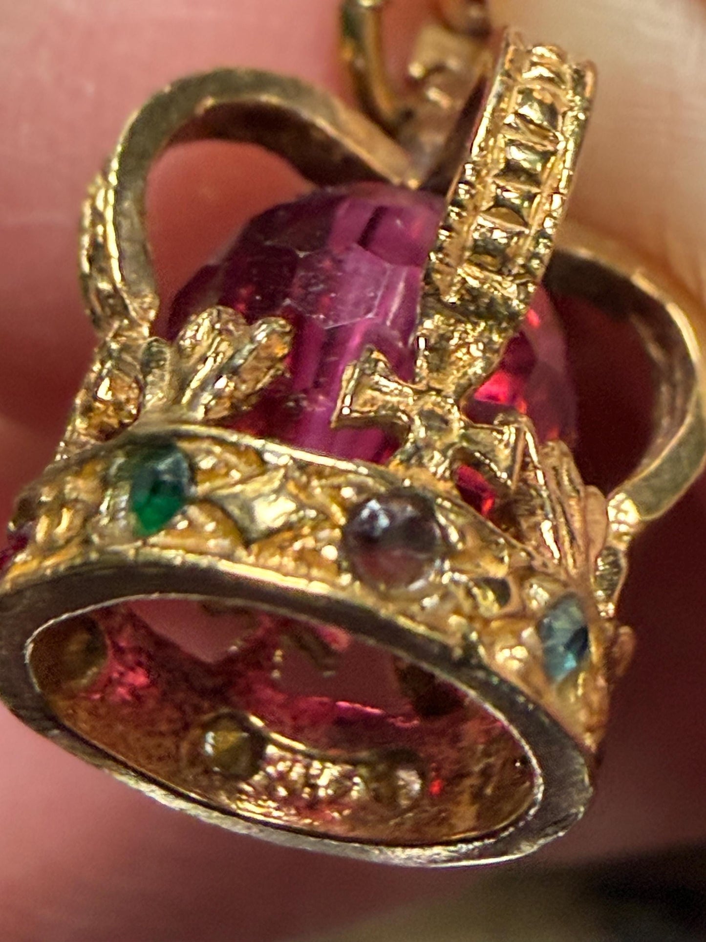 Beautiful jewelled crown charm .2.5 g in weight 20 m x9 m approximately
