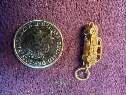 Lovely 9 ct gold London Taxi beautifully hallmarked .