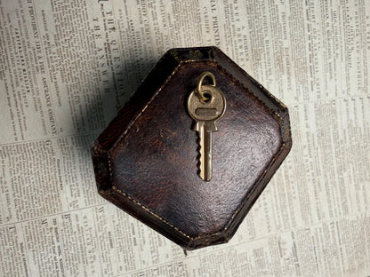 Little hallmarked 9 ct key
