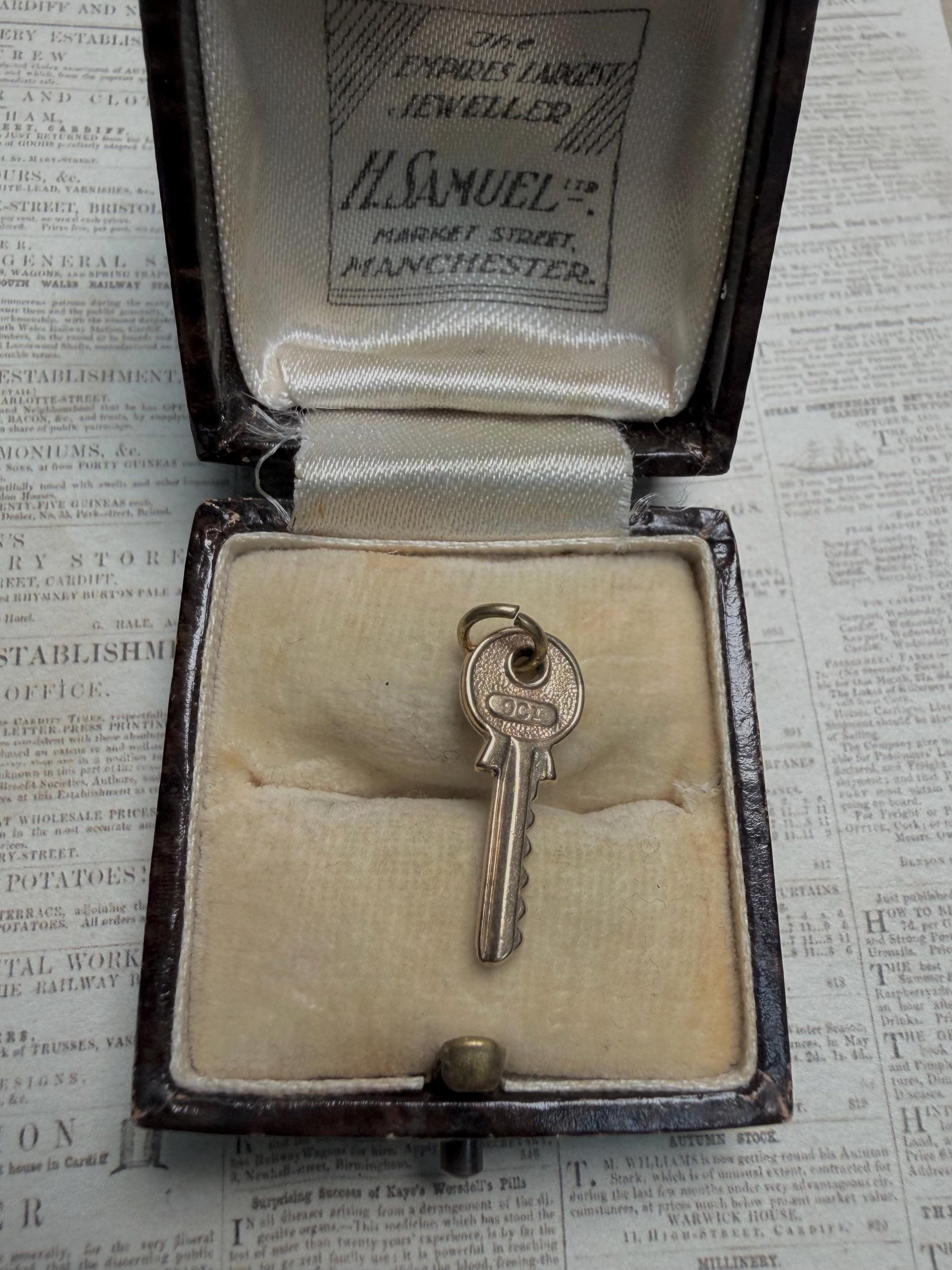 Little hallmarked 9 ct key